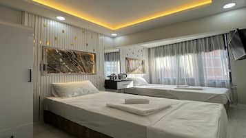 Economy Twin Room | Individually decorated, individually furnished, blackout drapes