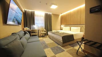 Deluxe Double or Twin Room | Minibar, in-room safe, desk, laptop workspace
