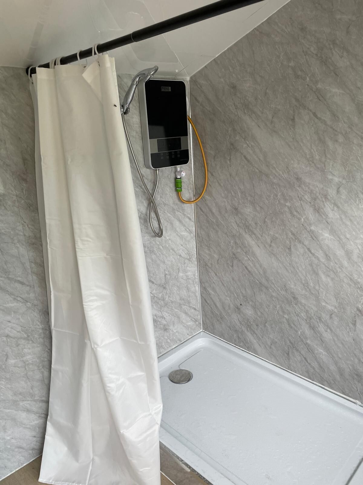 Shower, towels, toilet paper