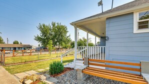 A house with a porch, steps, and a small garden area. - Grangeville Vacation Rental Near Downtown & Parks! (Grangeville)