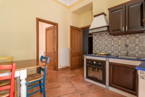Fridge, oven, electric kettle, cookware/dishes/utensils