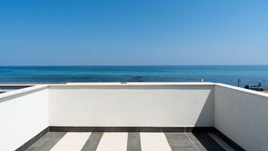 A balcony with a view of the sea. - Lolita's Beachfront Loft by Wonderful Italy (Bari)