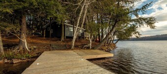 Serene Waterfront Cabin in the Woods | 4-Season Escape w/ WiFi, Kayaks & Firepit