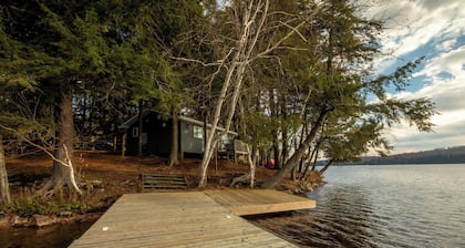 Serene Waterfront Cabin in the Woods | 4-Season Escape w/ WiFi, Kayaks & Firepit