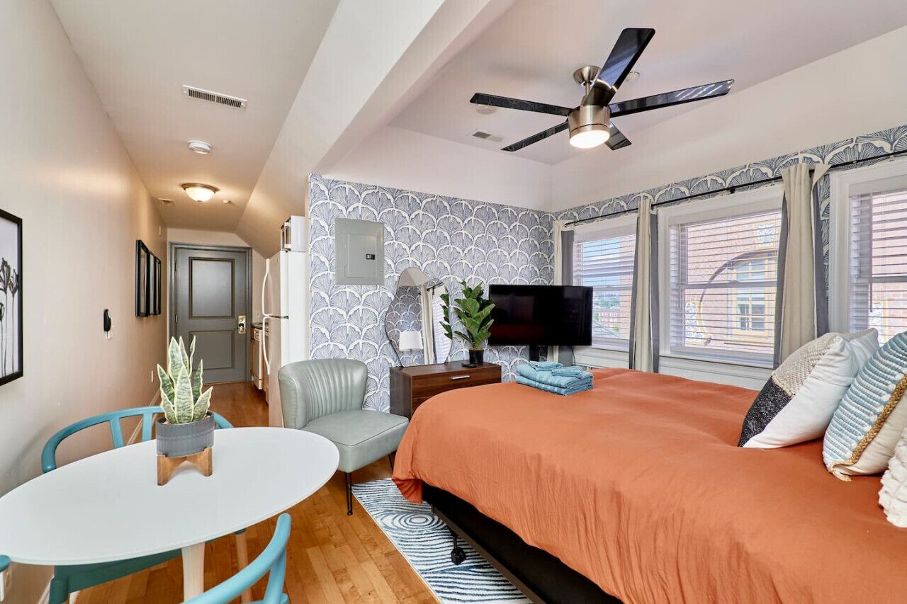 1 bedroom, desk, iron/ironing board, travel crib