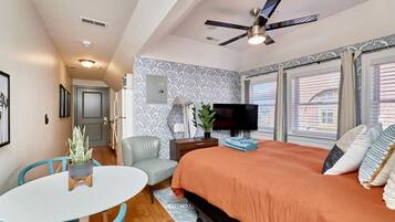 1 bedroom, desk, iron/ironing board, travel crib