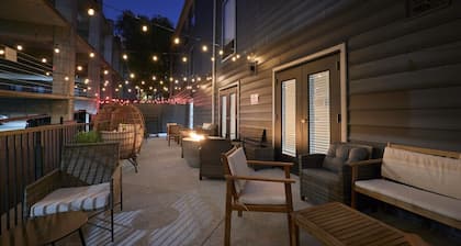 The West End Hotel King bed by Cortex, Forest Park & BJC