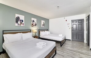 1 bedroom, desk, iron/ironing board, travel crib