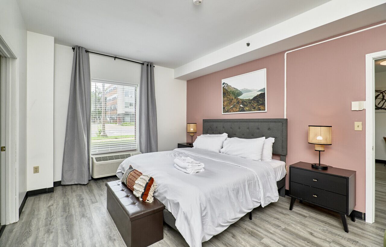 1 bedroom, desk, iron/ironing board, travel crib