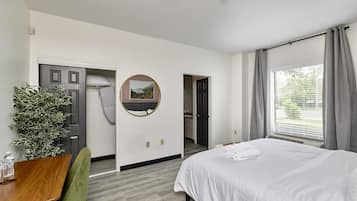 1 bedroom, desk, iron/ironing board, travel crib