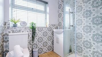 Shower, hair dryer, shampoo