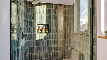 Shower, eco-friendly toiletries, hair dryer, towels
