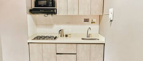 Apartment | Private kitchen | Fridge, microwave, cookware/dishes/utensils