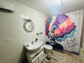 Hair dryer, towels, soap, shampoo