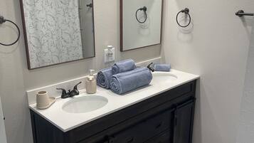 Shower, towels, toilet paper