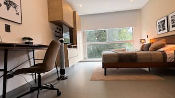 Appartamento Comfort | 1 camera, una cassaforte in camera, tende oscuranti, ferro/asse da stiro