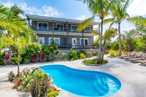 Migrate Beach Chalets #4, sleeps 7. N Palmetto Point. WiFi. AC. Pools. Paradise!