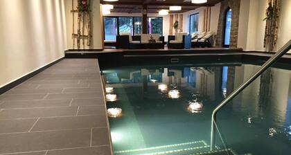 New modern vacation apartment with hotel connection - pool and sauna included