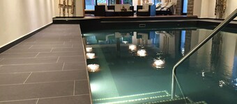 Neue moderne Ferienwohnung mit Hotelanschluss - Pool und Sauna inklusive