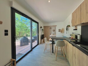 Fridge, microwave, stovetop, coffee/tea maker
