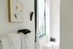 Suite 1: The Pink Room | Bathroom | Hair dryer, towels, soap, shampoo