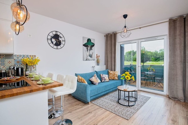 Comfortable Living Room with Sofa Bed and Smart TV | Book Now with RENTUJEMY