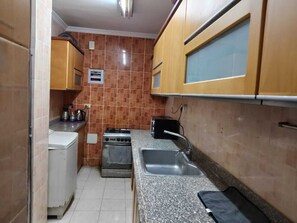 Chambre Confort Double ou avec lits jumeaux, vue ville | Cuisine privée | Réfrigérateur dans l'espace commun