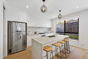 Fridge, toaster, kitchen islands