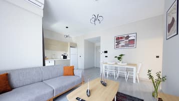 Standard Apartment, Multiple Beds, Non Smoking, Kitchenette (with Sofabed) | In-room safe, desk, laptop workspace, iron/ironing board