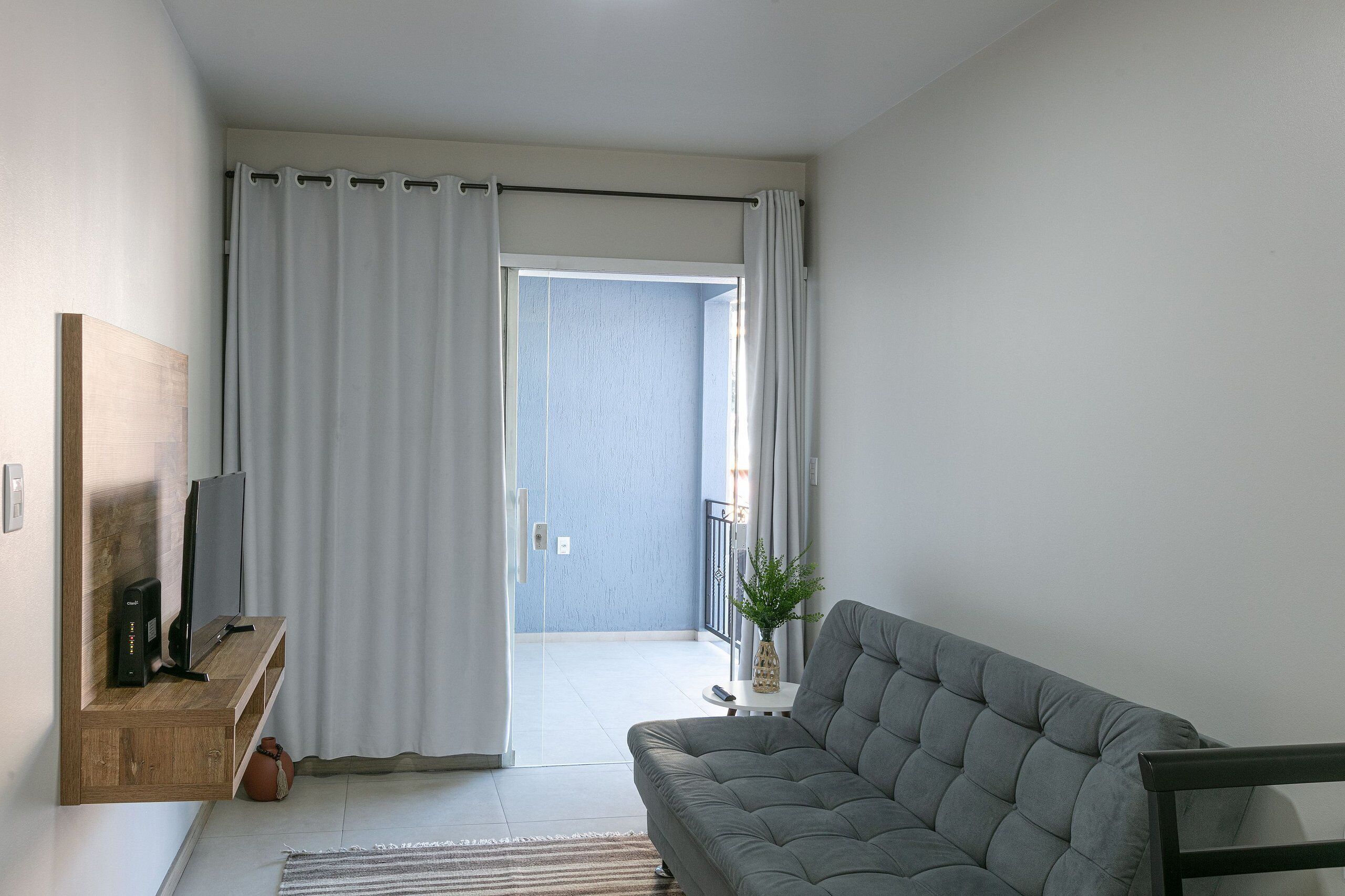 Apartamento | Área de estar | Smart TV 24 polegadas com canais digitais