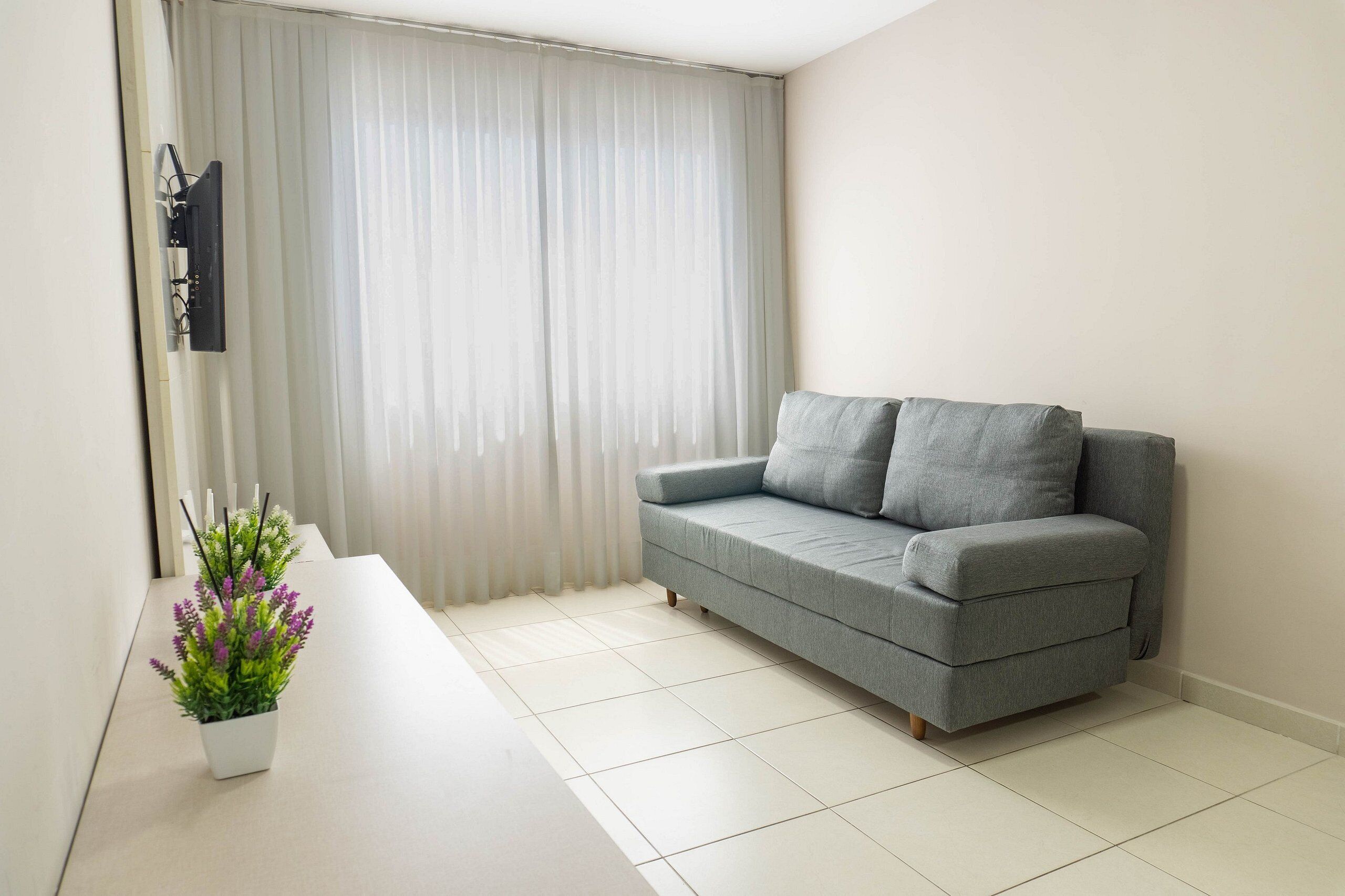 Apartamento | Área de estar | TV