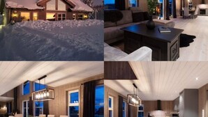Un moderno albergue con un amplio comedor, una sala de estar acogedora y una cocina bien iluminada.
