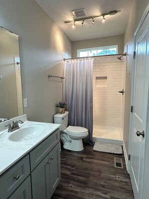Shower, hair dryer, towels, soap - Grace Delani Getaway. Charming 3 bedroom home located in Gastonia, NC. (Gastonia)