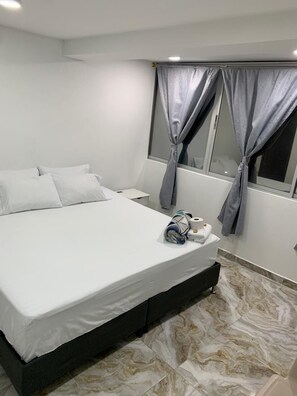 ห้องคอมฟอร์ท, วิวเมือง | เตียงพร้อมฟูกเสริมที่นอน, Wi-Fi ฟรี, ผ้าปูที่นอน