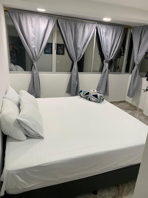 ห้องคอมฟอร์ท, วิวเมือง | เตียงพร้อมฟูกเสริมที่นอน, Wi-Fi ฟรี, ผ้าปูที่นอน