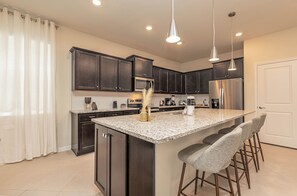 Fridge, microwave, oven, stovetop - Spacious 8-bedroom home in Clermont, FL, perfect for large groups! (Clermont)