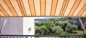 Apartment 'La Casa Rosa' with Sea View, Wi-Fi and Air Conditioning