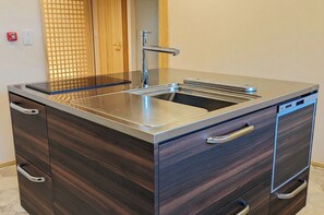 Fridge, microwave, stovetop, cookware/dishes/utensils