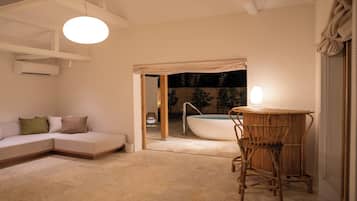 Luxury Villa | Living area | 50-inch flat-screen TV with digital channels