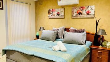 4 habitaciones, tabla de planchar con plancha, wifi y ropa de cama