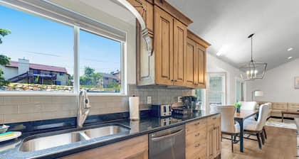 Spacious 5-bedroom retreat with AC and WiFi inSouth Ogden. Relax in our Hot Tub