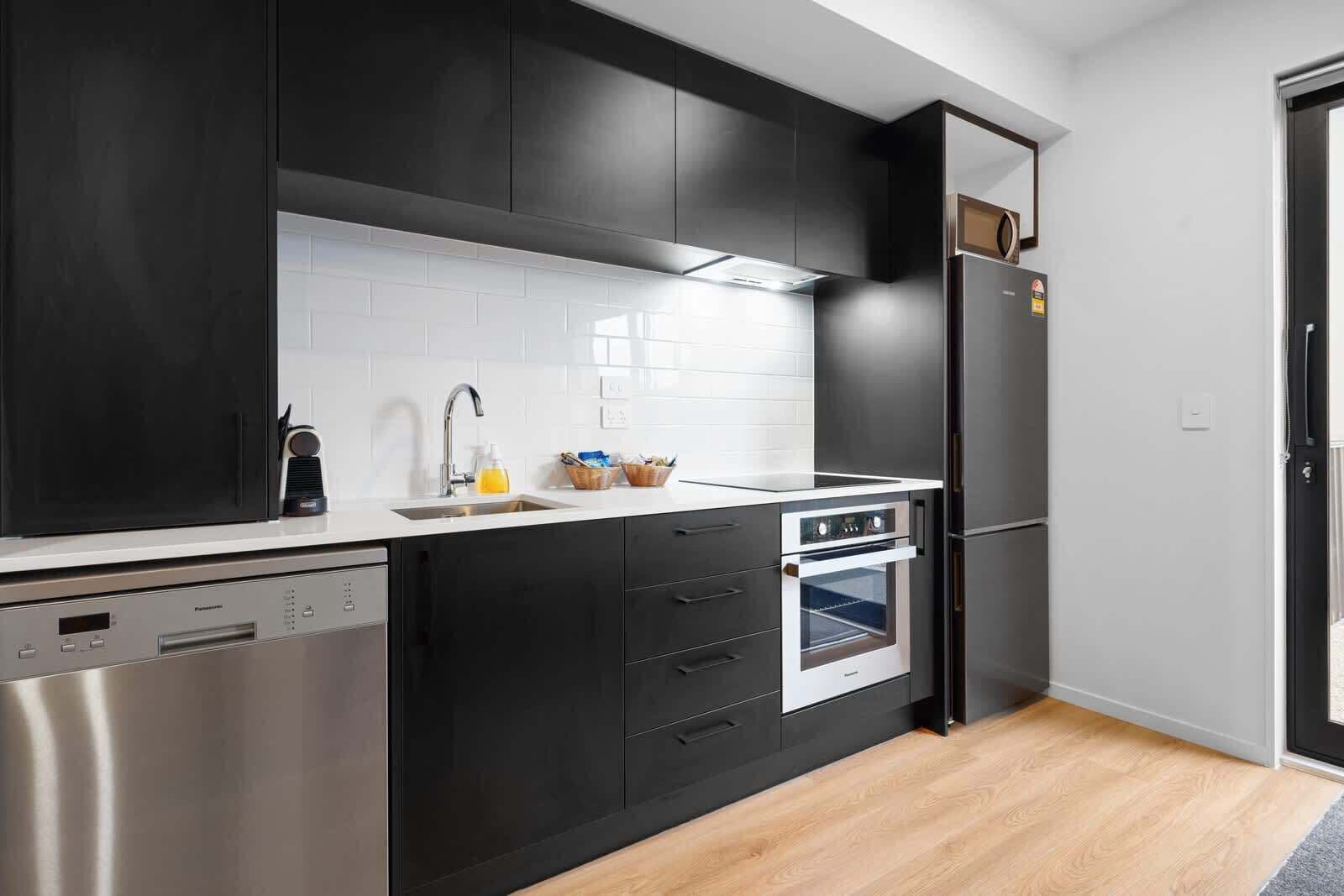 Coffee/tea maker, fridge, microwave, oven