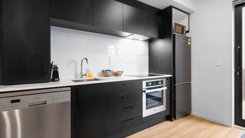 Coffee/tea maker, fridge, microwave, oven