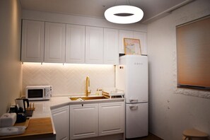 Romantic Villa, 2 Bedrooms, Non Smoking, City View | Private kitchen | Fridge, dining tables