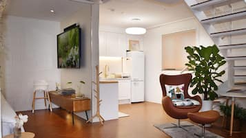 Romantic Villa, 2 Bedrooms, Non Smoking, City View | Living area | 65-inch Smart TV with digital channels, heated floors