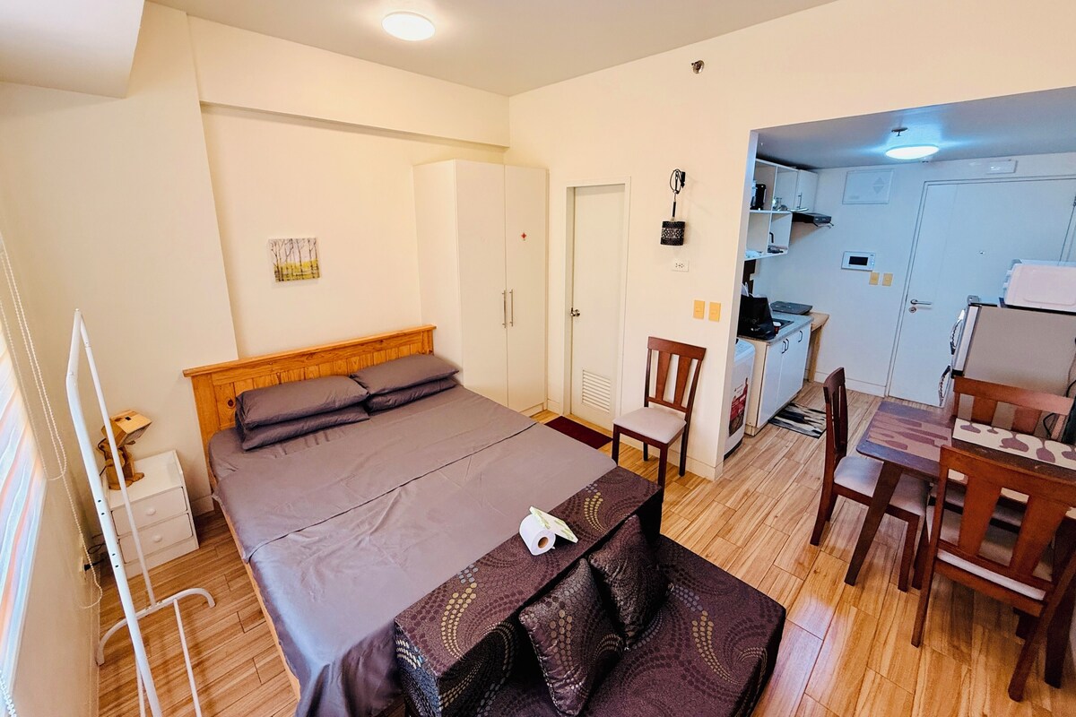 JFam Suites C4-11S | Blackout drapes, iron/ironing board, WiFi (free), bed sheets