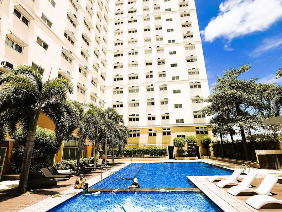 Outdoor pool, open 6:00 AM to 10:00 PM, free pool cabanas