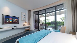 A modern hotel room with a large bed, a flat-screen TV mounted on the wall, a desk with a chair, and a view of the outdoors through large windows. - CZD HOTEL (Shenzhen)
