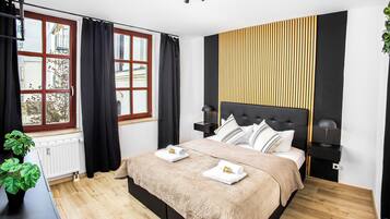 1 bedroom, desk, iron/ironing board, travel cot