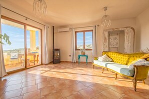 Family Apartment, Multiple Bedrooms (The Blue Whale) | Living area | Flat-screen TV, stereo - The Blue Whale (La Maddalena)